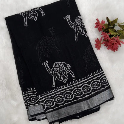 Black block printed linen cotton saree with double side silver zari borders (lightweight,soft) printed pallu with silver zari stripes, plain running blouse with borders. NS62