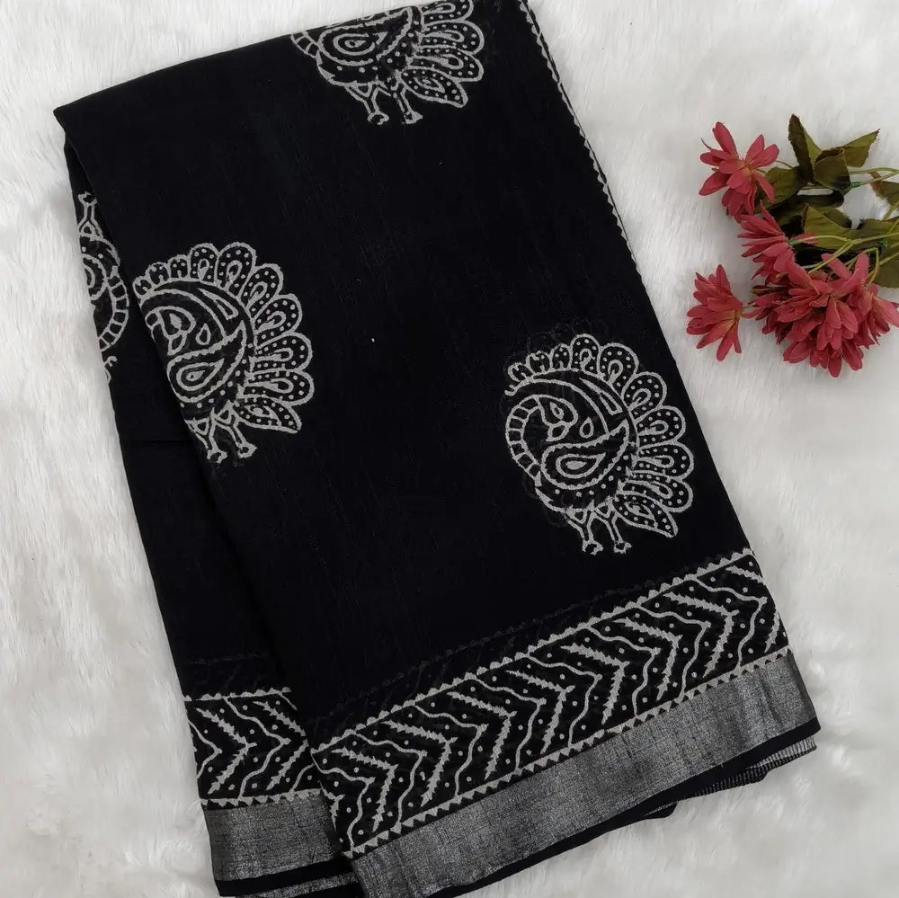 Black block printed linen cotton saree with double side silver zari borders (lightweight,soft) printed pallu with silver zari stripes, plain running blouse with borders. NS61