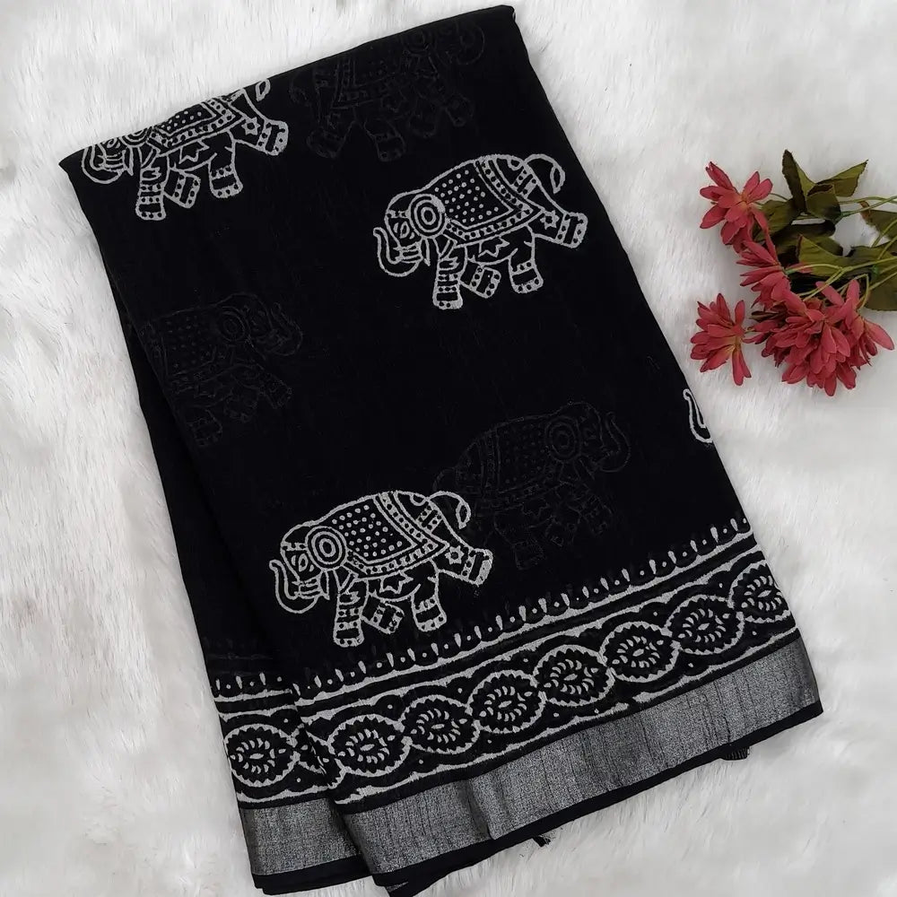 Black block printed linen cotton saree with double side silver zari borders (lightweight,soft) printed pallu with silver zari stripes, plain running blouse with borders. NS63