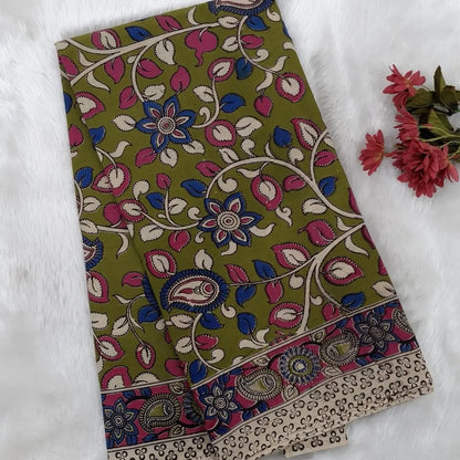 Mehandhi Green kalamkari hand block printed cotton saree, printed pallu and kalamkari printed blouse with borders. INCONSISTENT PRINTS AND DYES ARE NOT DEFECTS.NS66
