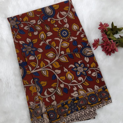 Reddish maroon kalamkari hand block printed cotton saree, printed pallu and kalamkari printed blouse with borders. INCONSISTENT PRINTS AND DYES ARE NOT DEFECTS.NS65