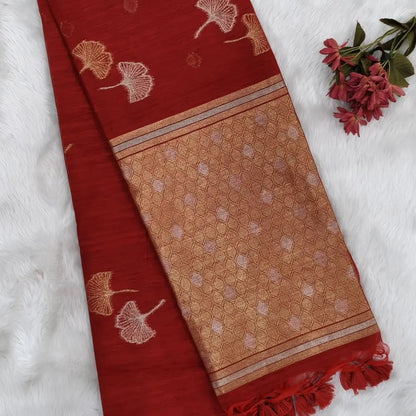 Bright red premium tussar jamdani saree with gold and silver zari weaving all over, rich weaving on pallu, running blouse with zari woven buttas and borders. NS77