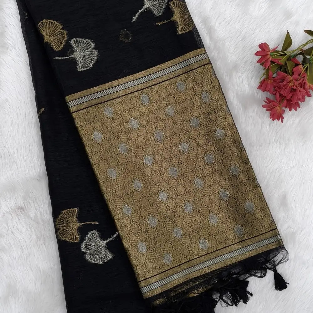 Black Premium tussar jamdani saree with gold and silver zari weaving all over, rich weaving on pallu, running blouse with zari woven buttas and borders. NS73