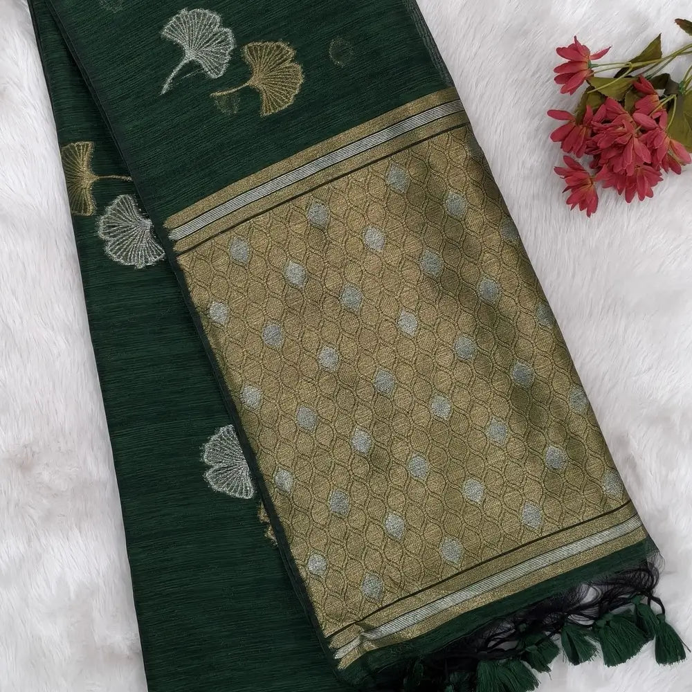 Bottle green premium tussar jamdani saree with gold and silver zari weaving all over, rich weaving on pallu, running blouse with zari woven buttas and borders. NS75