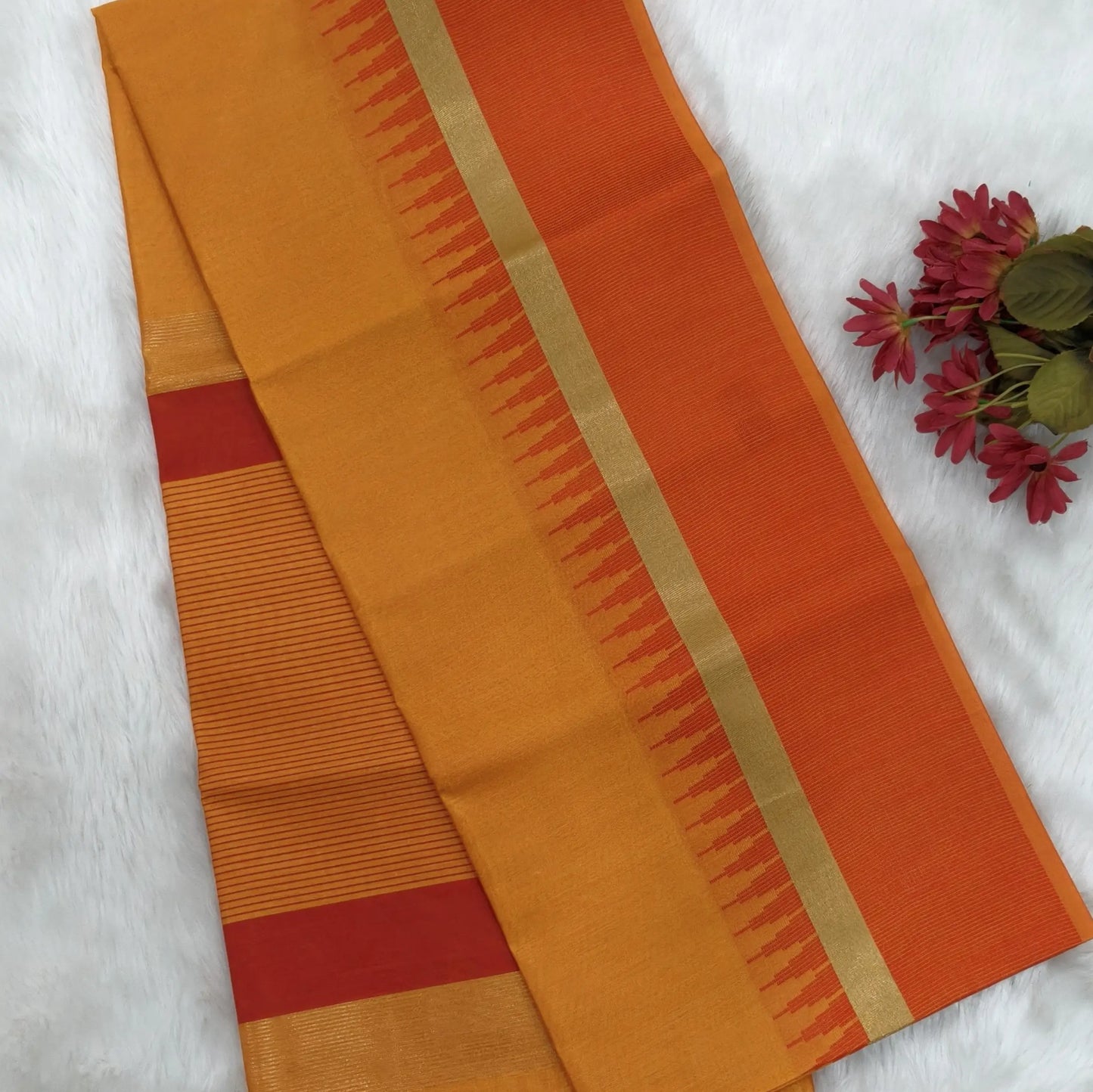Light orange with reddish maroon silk cotton saree with thread woven double side borders, zari striped short pallu and contrast blouse with borders. NS82