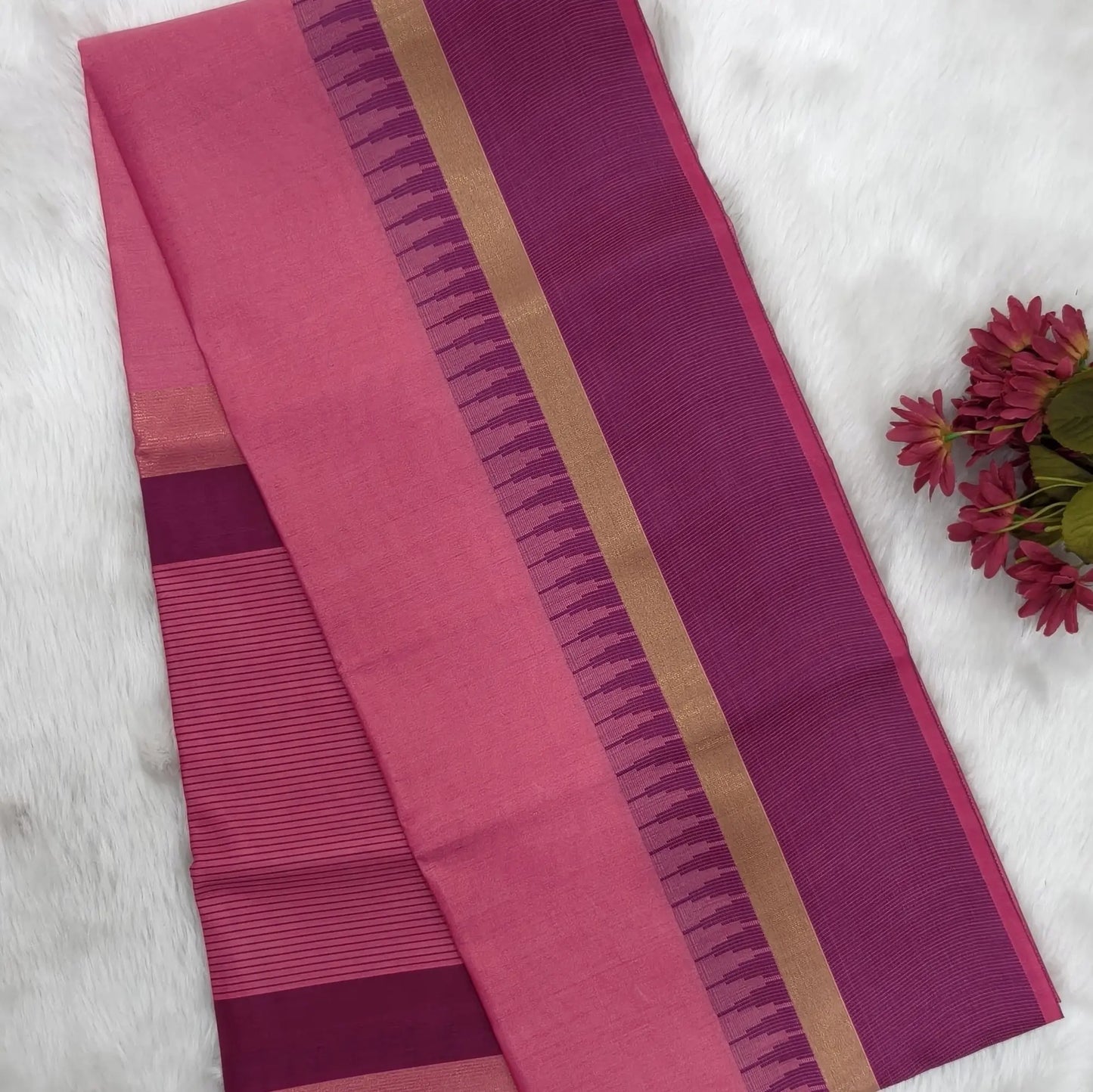 Pink with beetroot purple silk cotton saree with thread woven double side borders, zari striped short pallu and contrast blouse with borders. NS79