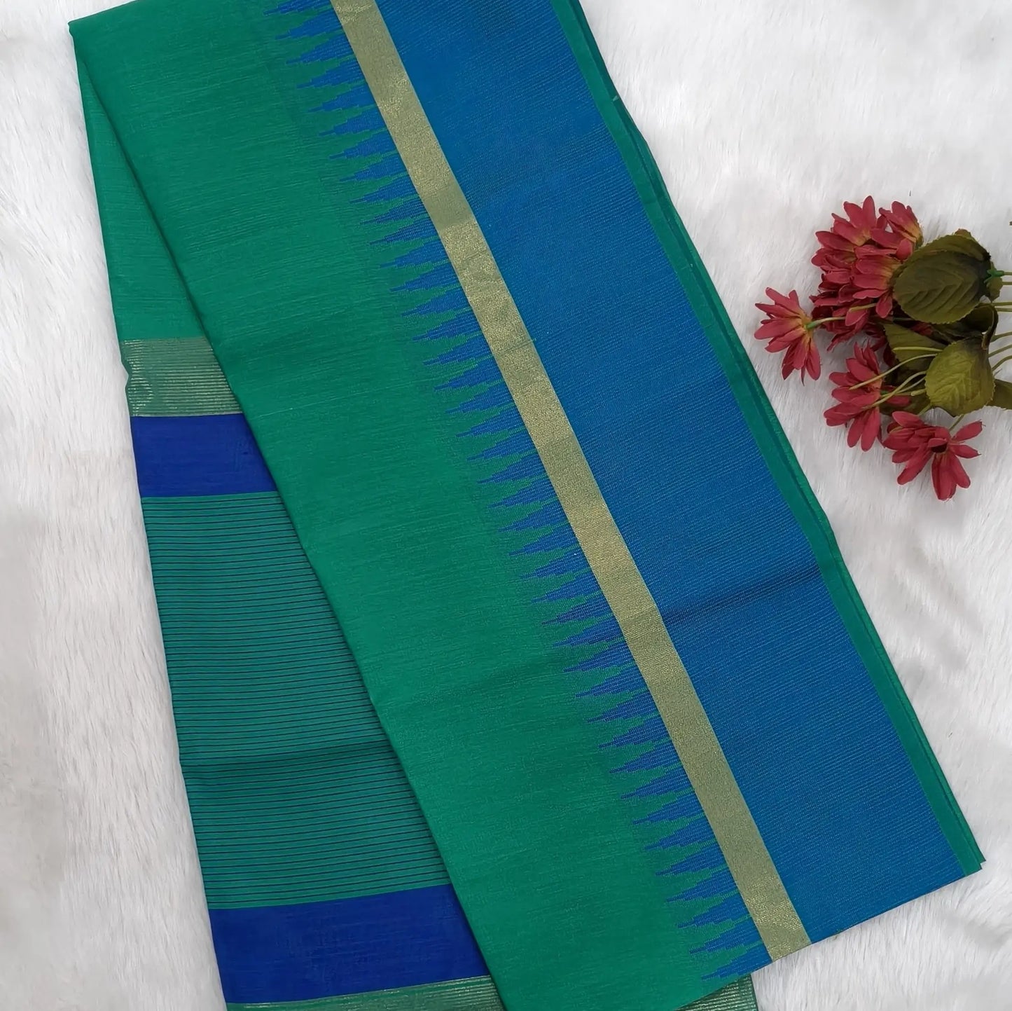 Teal green with ink blue silk cotton saree with thread woven double side borders, zari striped short pallu and contrast blouse with borders. NS83