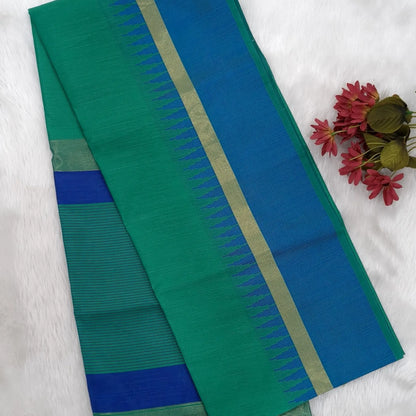 Teal green with ink blue silk cotton saree with thread woven double side borders, zari striped short pallu and contrast blouse with borders. NS83