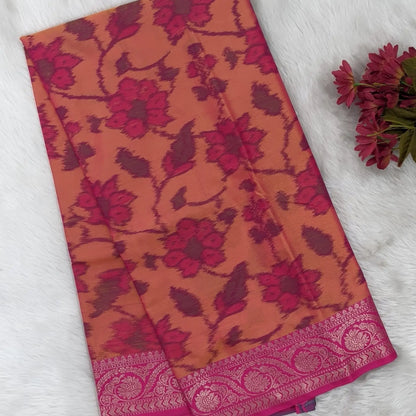 Peachish Pink dual shaded ikat printed soft silk saree with silver zari woven double side borders, contrast printed pallu, contrast running blouse with zari woven borders. NS95