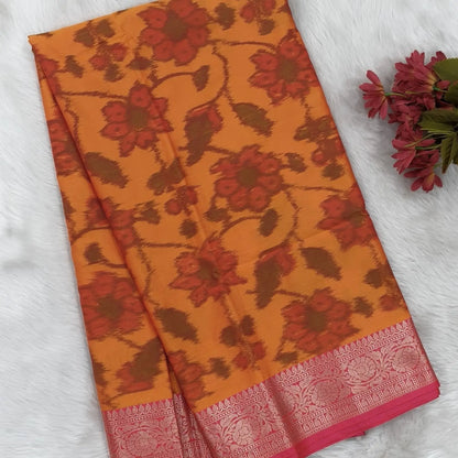 Orange dual shaded ikat printed soft silk saree with silver zari woven double side borders, contrast printed pallu, contrast running blouse with zari woven borders. NS97