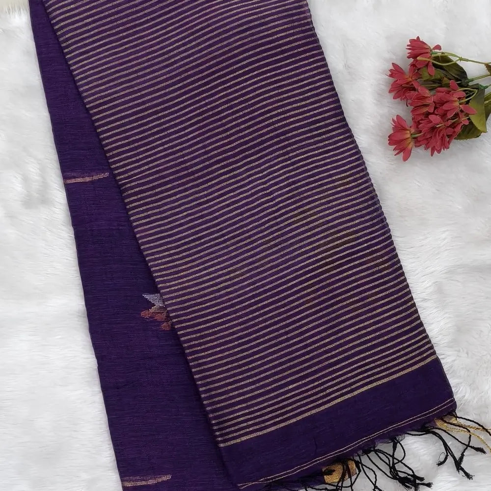 Purple pure linen jamdani woven saree,with gold tissue double side borders,striped tissue pallu with tassles, plain running blouse with borders.(DRY CLEAN RECOMMENDED ). NS114