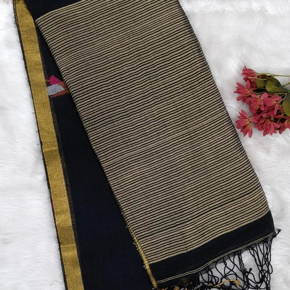 Black pure linen jamdani woven saree, with gold tissue double side borders,striped tissue pallu with tassles, plain running blouse with borders.(DRY CLEAN RECOMMENDED ). NS113
