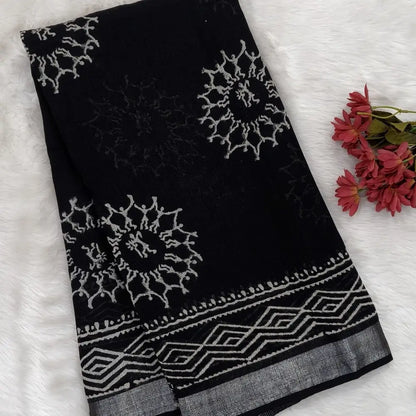 Black block printed linen cotton saree with double side silver zari borders (lightweight,soft) printed pallu with silver zari stripes, plain running blouse with borders. NS108