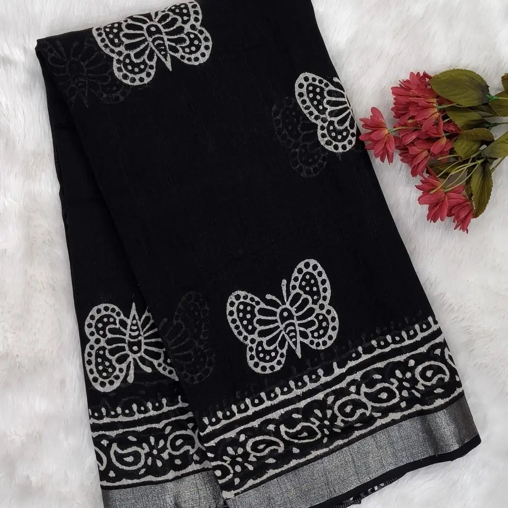Black block printed linen cotton saree with double side silver zari borders (lightweight,soft) printed pallu with silver zari stripes, plain running blouse with borders. NS110