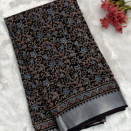 Black ajrak hand block printed pure dola silk saree, benarasi zari woven double side borders, hand block printed pallu, running blouse with borders.(DRY CLEAN RECOMMENDED , MILD STAINS AND DYES ARE NOT DEFECTS). NS102