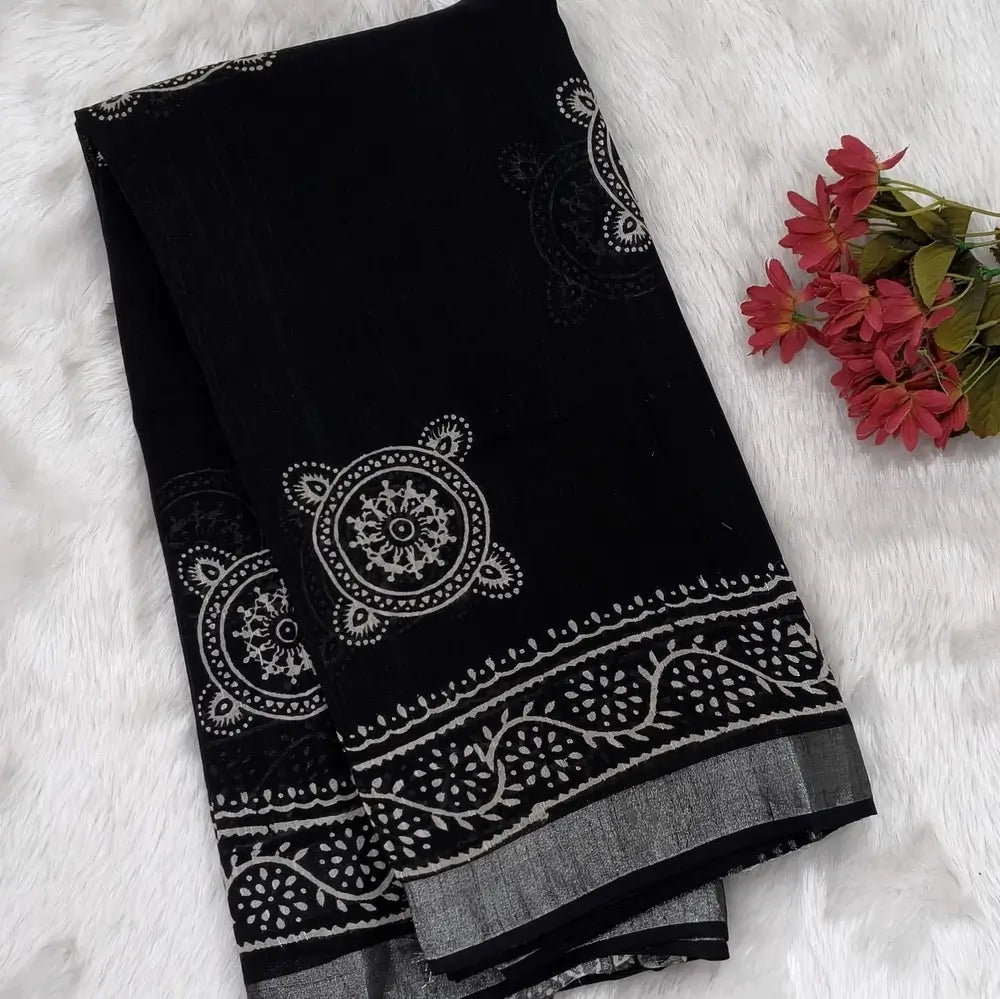 Black block printed linen cotton saree with double side silver zari borders (lightweight,soft) printed pallu with silver zari stripes, plain running blouse with borders. NS105