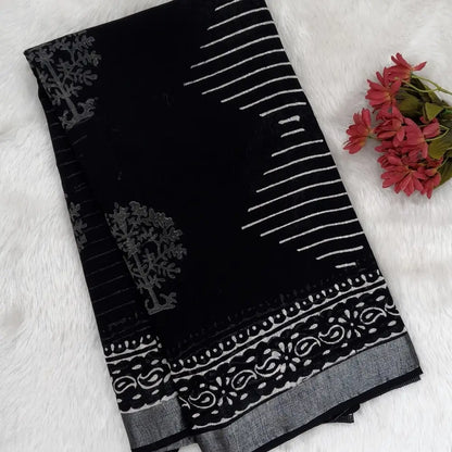 Black block printed linen cotton saree with double side silver zari borders (lightweight,soft) printed pallu with silver zari stripes, plain running blouse with borders. NS104
