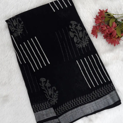 Black block printed linen cotton saree with double side silver zari borders (lightweight,soft) printed pallu with silver zari stripes, plain running blouse with borders. NS106