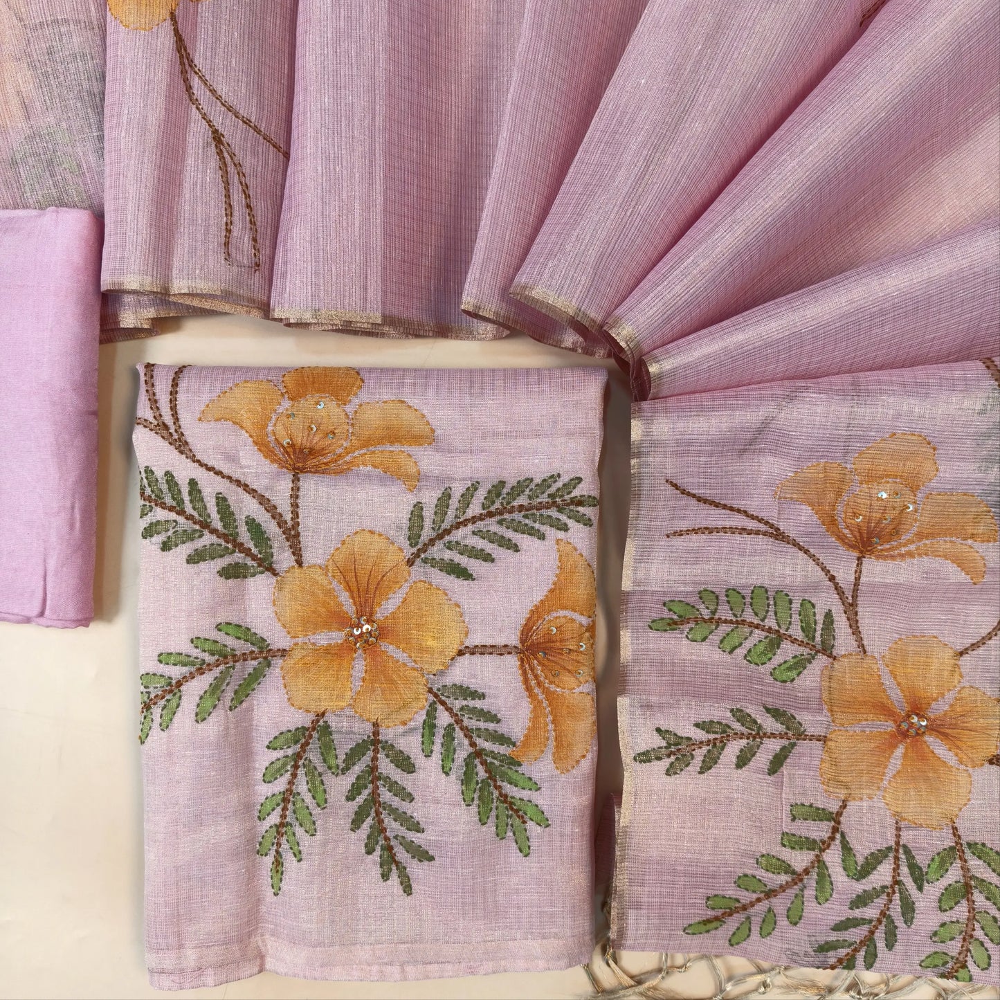 Designer pastel pink golden tint tissue kota unstitched salwar material, floral design with hand brush paint, kantha stitch and sequins on front,(lining needed)santoon bottom,floral printed and brush paint on tissue kota dupatta. AG262122