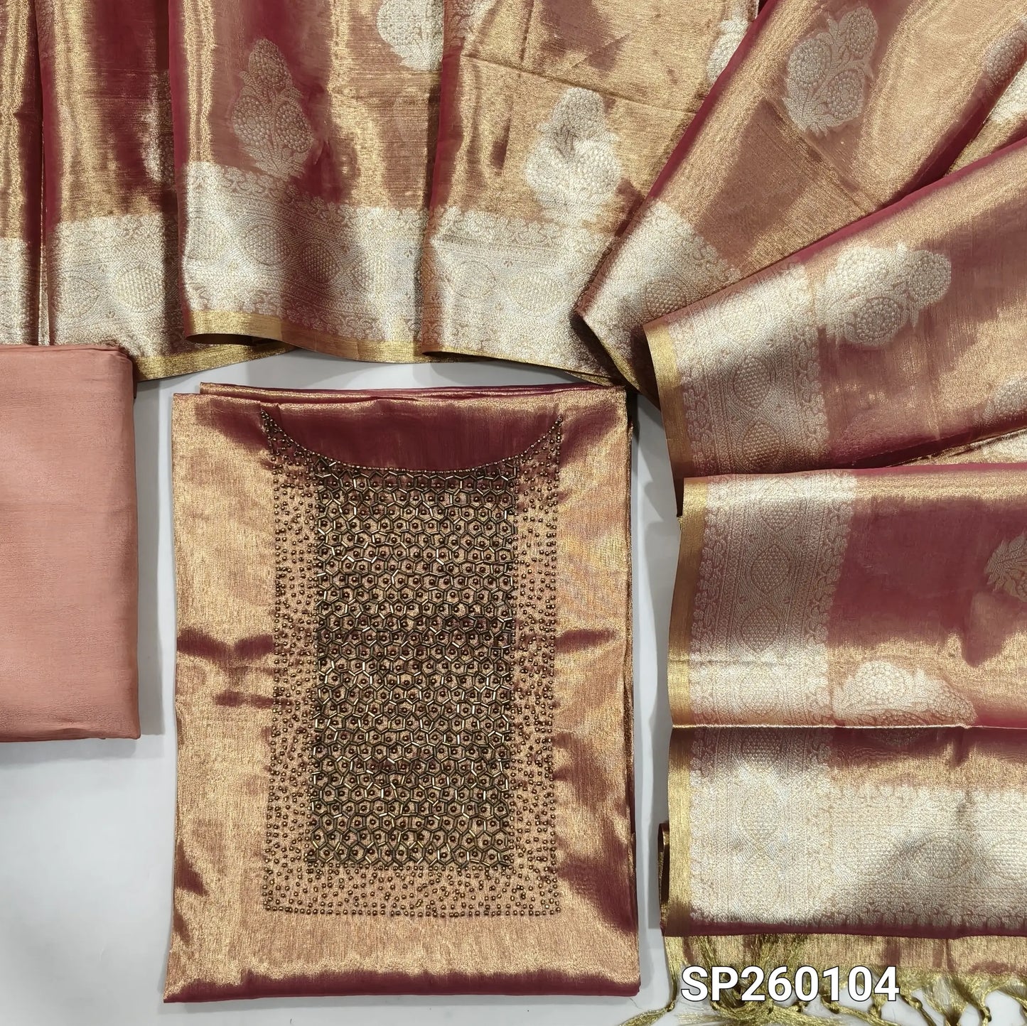 Pink with golden tint premium tissue silk unstitched salwar material, rich cut bead and sugar bead detailing on yoke (Shimmer, Lining Needed) Matching santoon bottom, tissue silk benarasi zari woven dupatta. SP260104