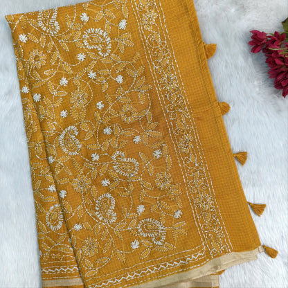 Yellow premium kota silk saree(soft, thin)with rich hand embroidery work all over,thin tissue borders,rich embroidered pallu,running blouse with embroidery and borders. NS290