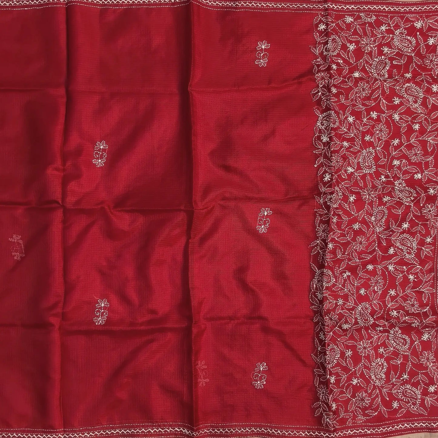 Bright red premium kota silk saree(soft, thin)with rich hand embroidery work all over,thin tissue borders,rich embroidered pallu,running blouse with embroidery and borders. NS289