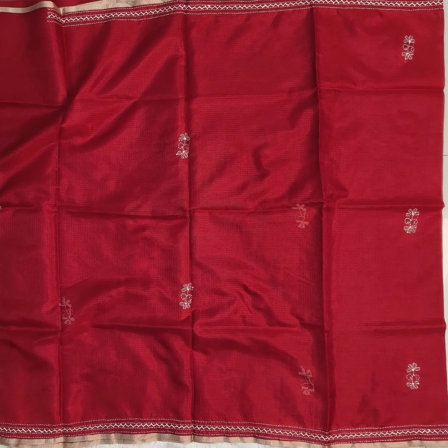 Bright red premium kota silk saree(soft, thin)with rich hand embroidery work all over,thin tissue borders,rich embroidered pallu,running blouse with embroidery and borders. NS289