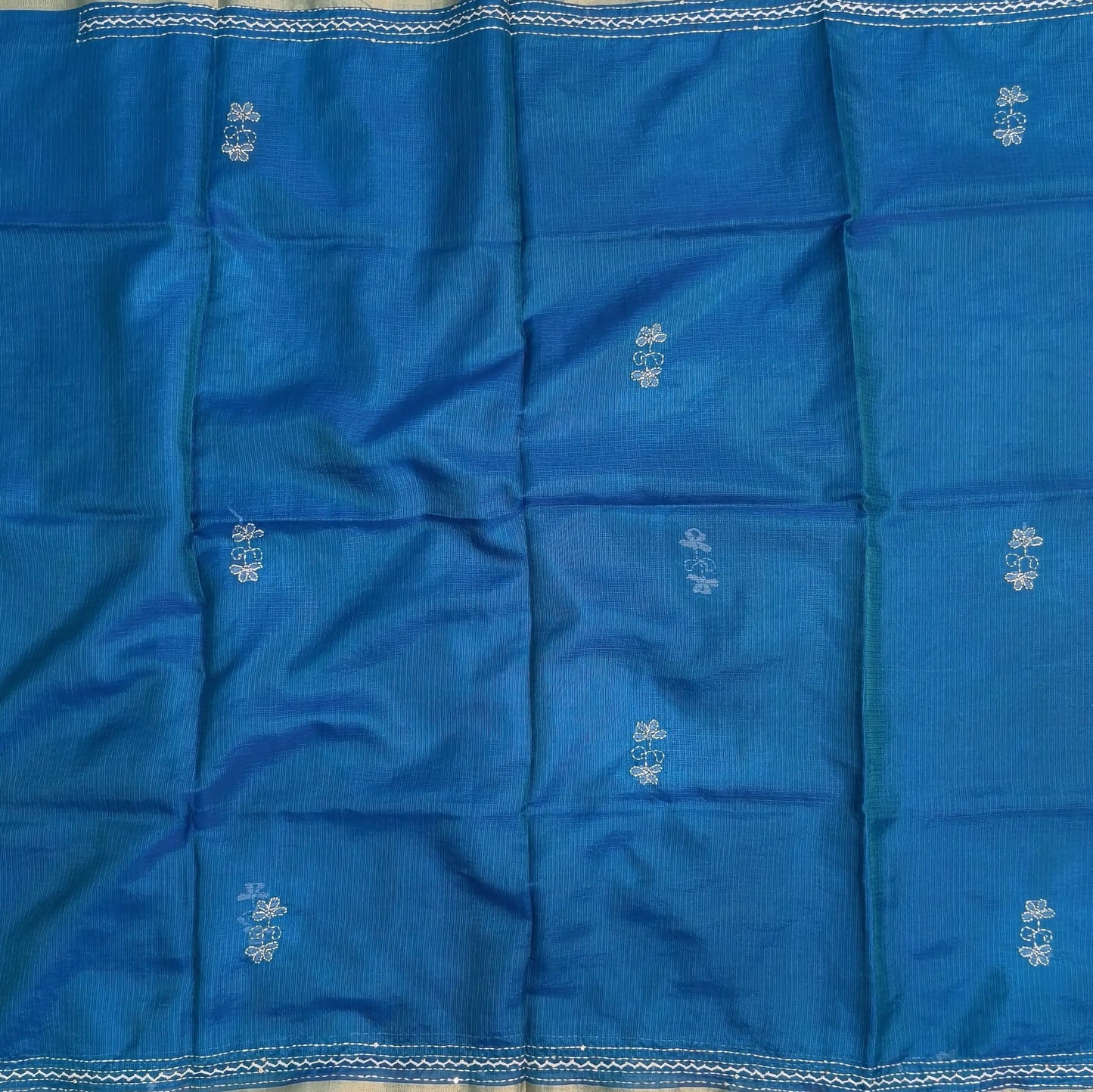 Turquoise blue premium kota silk saree(soft, thin)with rich hand embroidery work all over,thin tissue borders,rich embroidered pallu,running blouse with embroidery and borders. NS292