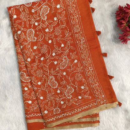 Rust orange premium kota silk saree(soft, thin)with rich hand embroidery work all over,thin tissue borders,rich embroidered pallu,running blouse with embroidery and borders. NS293