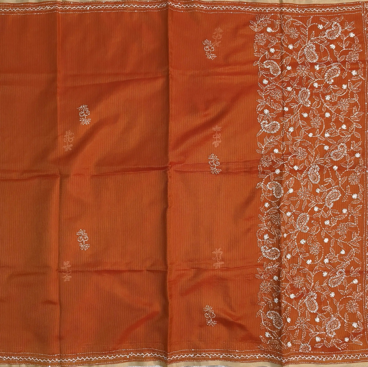 Rust orange premium kota silk saree(soft, thin)with rich hand embroidery work all over,thin tissue borders,rich embroidered pallu,running blouse with embroidery and borders. NS293