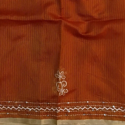 Rust orange premium kota silk saree(soft, thin)with rich hand embroidery work all over,thin tissue borders,rich embroidered pallu,running blouse with embroidery and borders. NS293