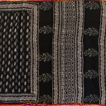 Black soft cotton printed saree with pom pom tapings (Thin, Soft)printed pallu, plain running blouse with borders. NS297