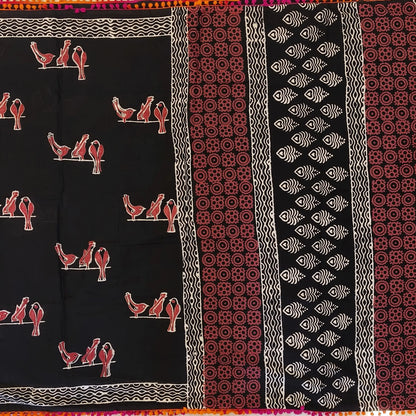 Black soft cotton printed saree with pom pom tapings (Thin, Soft)printed pallu, plain running blouse with borders. NS296