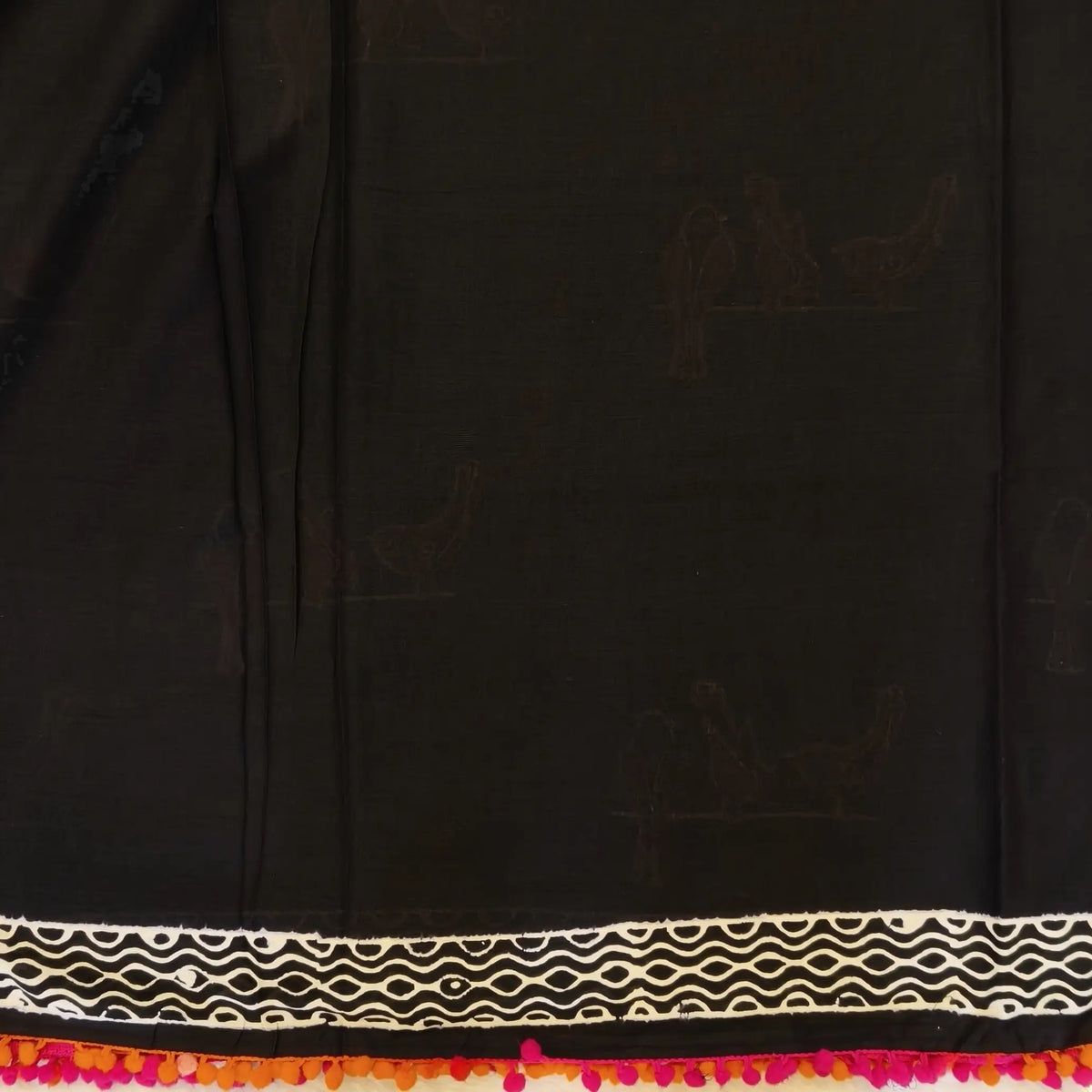 Black soft cotton printed saree with pom pom tapings (Thin, Soft)printed pallu, plain running blouse with borders. NS296