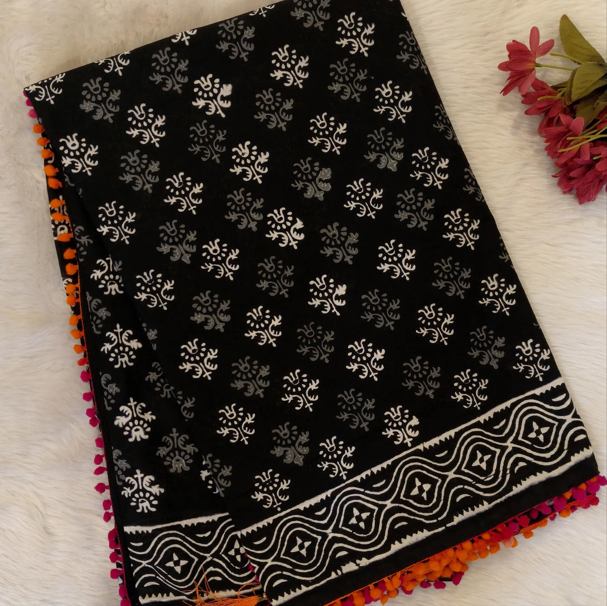 Black soft cotton printed saree with pom pom tapings (Thin, Soft)printed pallu, plain running blouse with borders. NS298