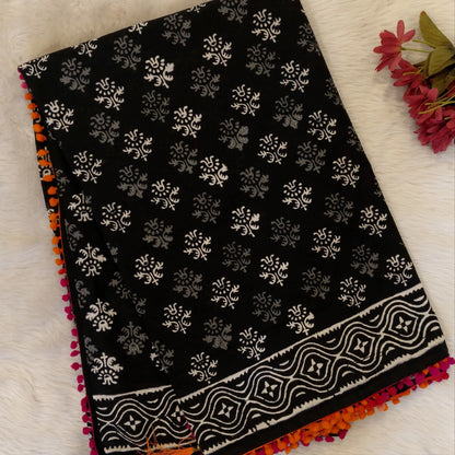 Black soft cotton printed saree with pom pom tapings (Thin, Soft)printed pallu, plain running blouse with borders. NS298