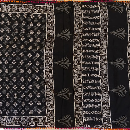 Black soft cotton printed saree with pom pom tapings (Thin, Soft)printed pallu, plain running blouse with borders. NS298