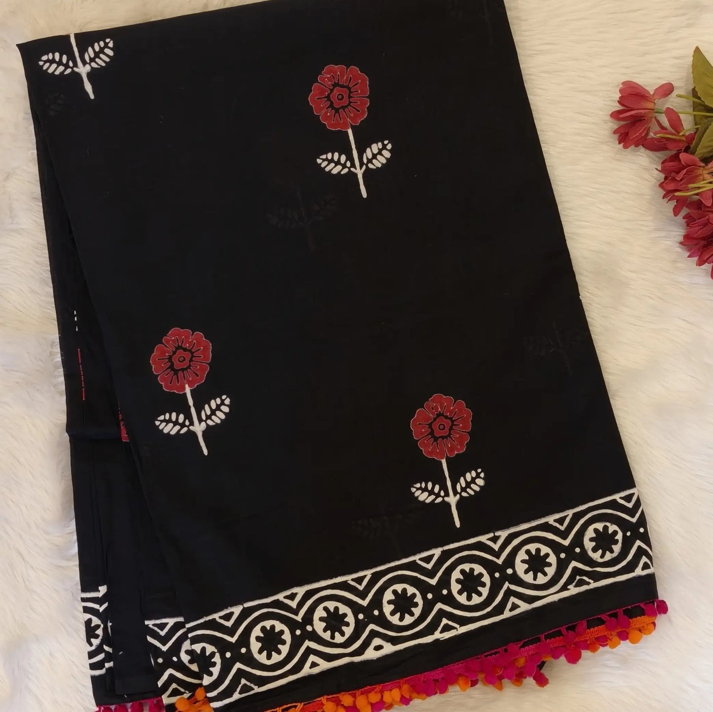 Black soft cotton printed saree with pom pom tapings (Thin, Soft)printed pallu, plain running blouse with borders. NS294