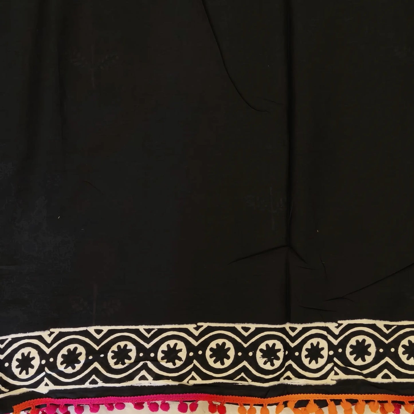Black soft cotton printed saree with pom pom tapings (Thin, Soft)printed pallu, plain running blouse with borders. NS298