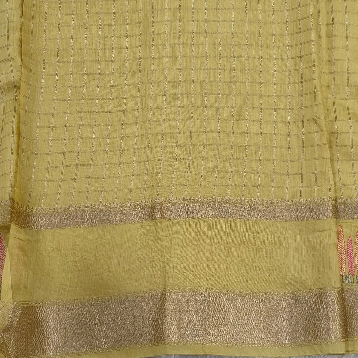 Designer pastel yellow assam silk saree with zari stripes all over (Soft, Thin) embroidered gap borders, zari stripes on pallu, running bluose with zari stripes and borders. NS305