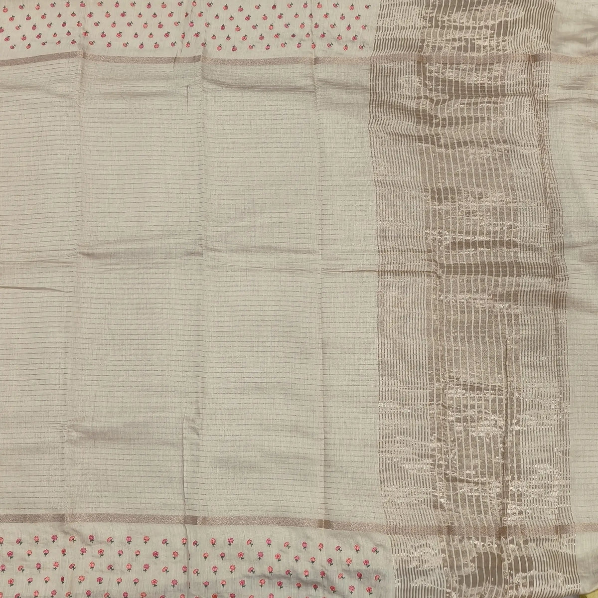 Designer off white assam silk saree with zari stripes all over (Soft, Thin) embroidered gap borders, zari stripes on pallu, running bluose with zari stripes and borders. NS304