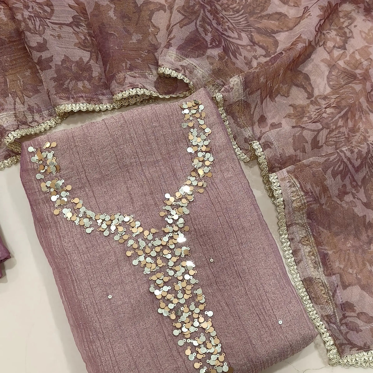 Pink with golden tint crushed organza silk unstitched salwar material,sequins work on yoke(lining needed)santoon bottom, digital printed crushed tissue silk dupatta with fancy lace tapping. SP261801