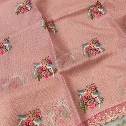 Pastel peach premium kota saree with embroidered bird and floral motifs all over (Thin, Lightweight) lace tapings as borders, rich embroidered pallu, plain running blouse. NS306