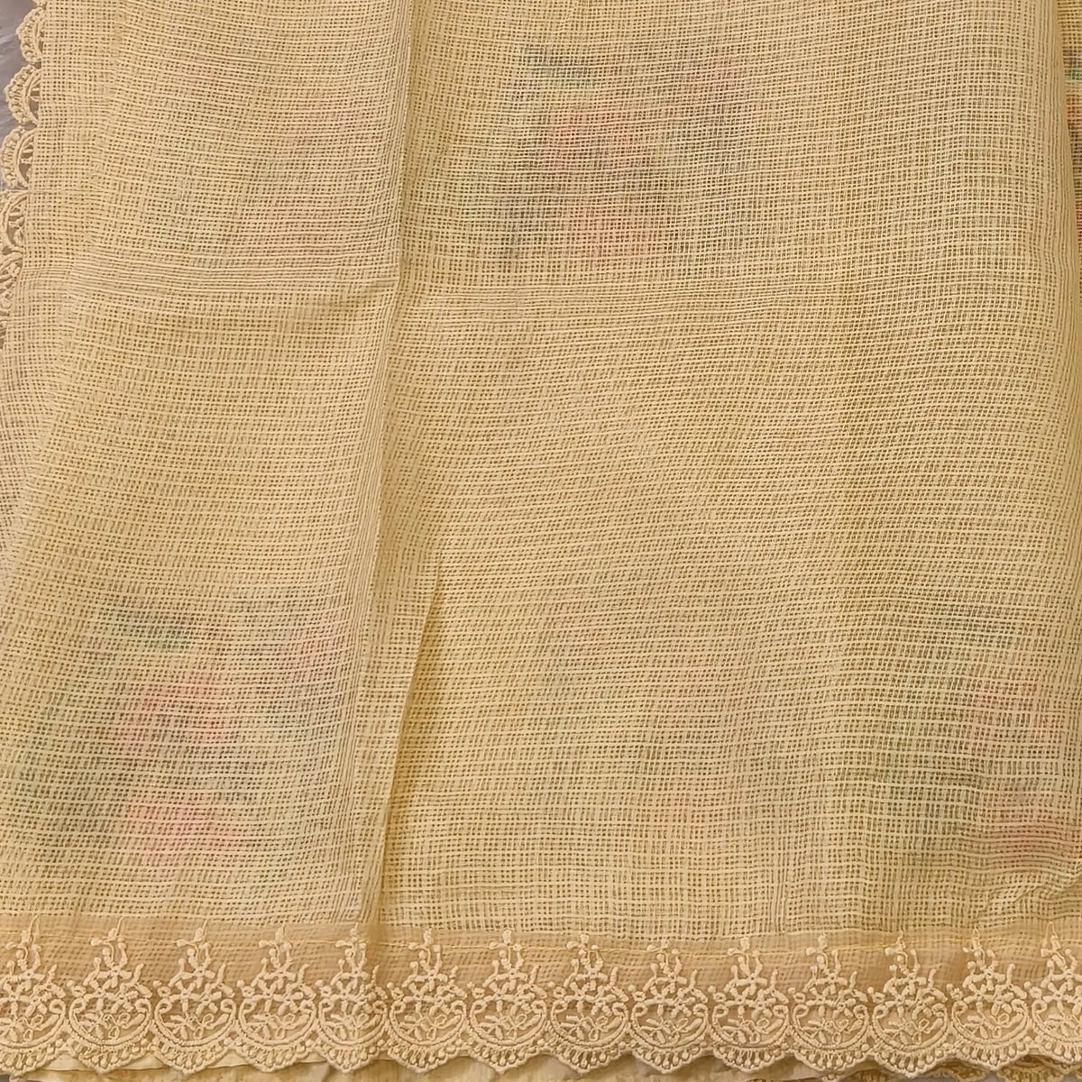 Pastel yellow premium kota saree with embroidered bird and floral motifs all over (Thin, Lightweight) lace tapings as borders, rich embroidered pallu, plain running blouse. NS307