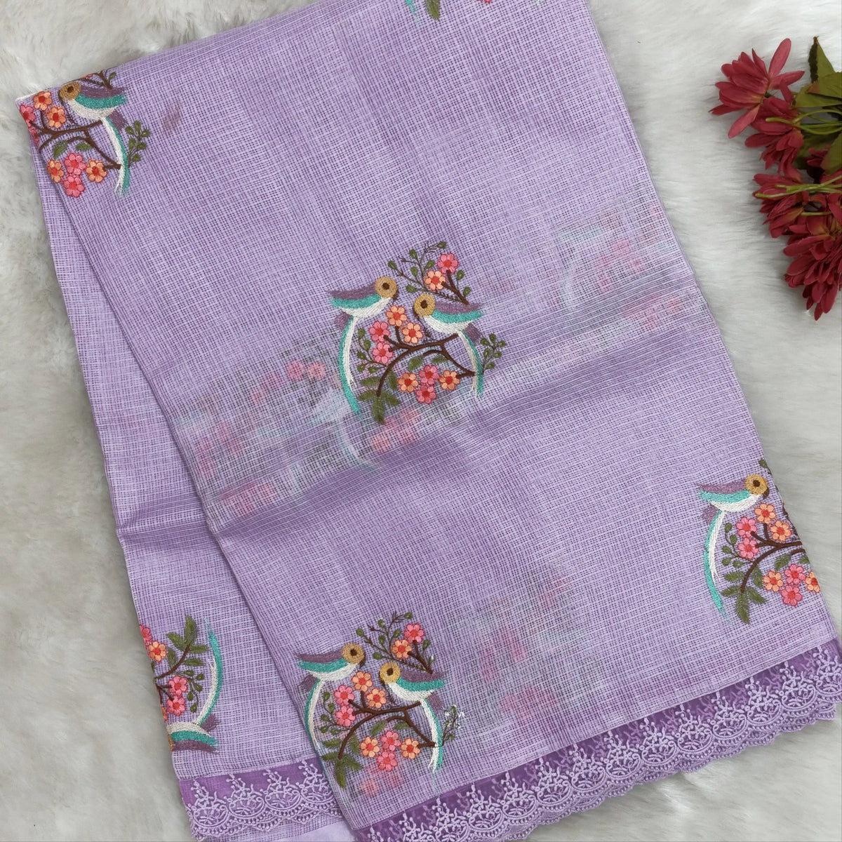 Pastel purple premium kota saree with embroidered bird and floral motifs all over (Thin, Lightweight) lace tapings as borders, rich embroidered pallu, plain running blouse. NS309
