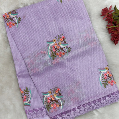 Pastel purple premium kota saree with embroidered bird and floral motifs all over (Thin, Lightweight) lace tapings as borders, rich embroidered pallu, plain running blouse. NS309