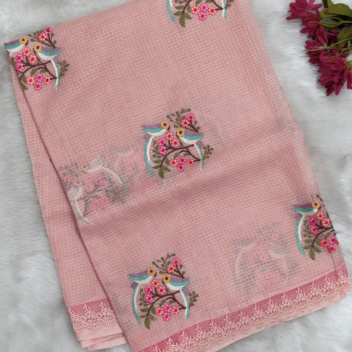 Pastel peach premium kota saree with embroidered bird and floral motifs all over (Thin, Lightweight) lace tapings as borders, rich embroidered pallu, plain running blouse. NS306