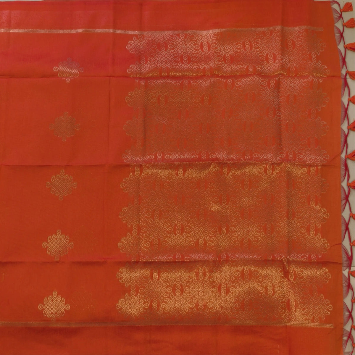 Orange semi tussar saree, with rich traditional zari weaving all over (thin, Textured) rich pallu, running blouse with zari woven buttas and borders. NS316