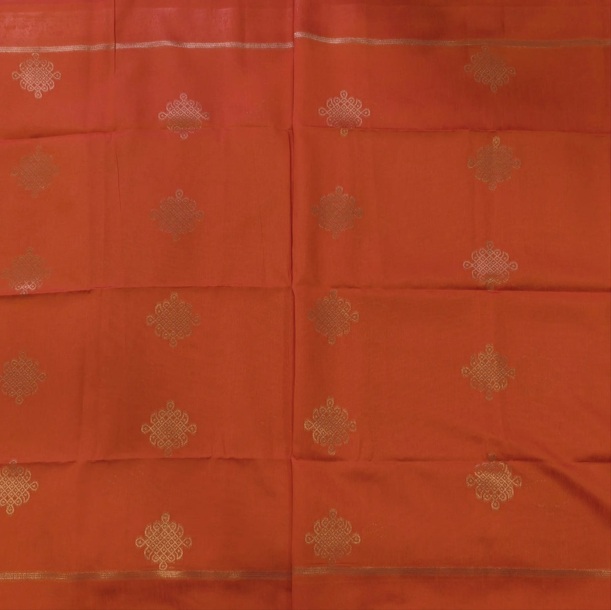 Orange semi tussar saree, with rich traditional zari weaving all over (thin, Textured) rich pallu, running blouse with zari woven buttas and borders. NS316