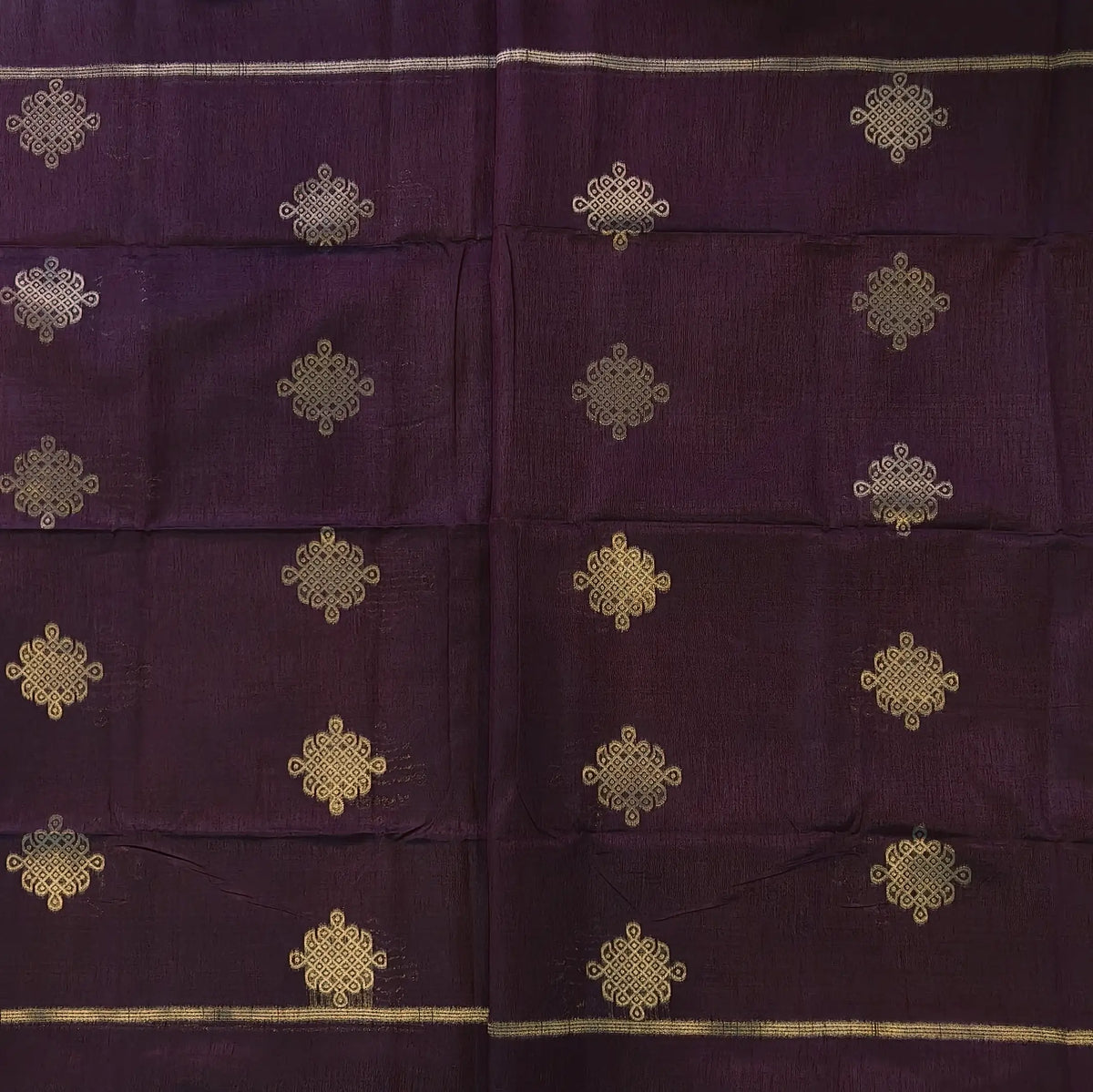 Dark brown semi tussar saree, with rich traditional zari weaving all over (thin, Textured) rich pallu, running blouse with zari woven buttas and borders. NS315